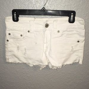 White distressed shorts